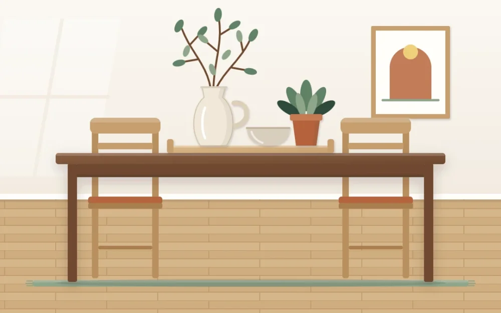 Side view of a wooden dining table with a tray holding a small potted plant, a ceramic jug of branches and a small bowl