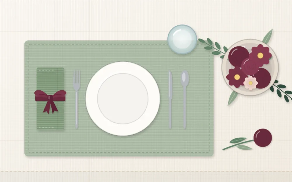 Top-down table corner with an ivory tablecloth, sage green napkins and placemat, and deep wine flowers and napkin ribbon